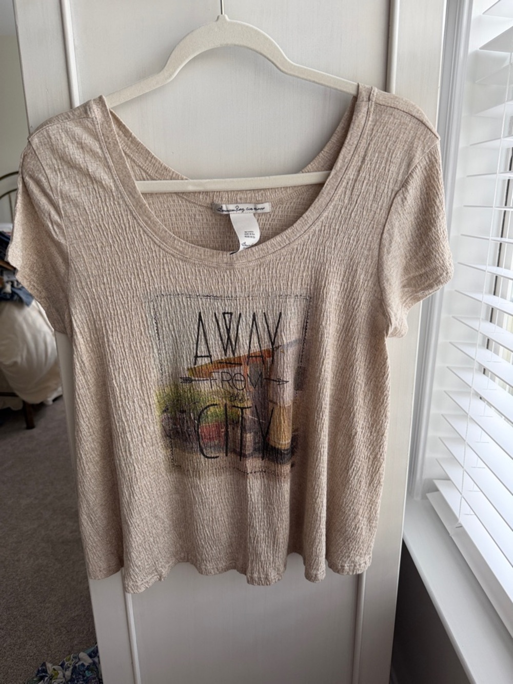 American Rag Beige Short Sleeve Scoop Neck Top with Subtle Multicolor Graphic